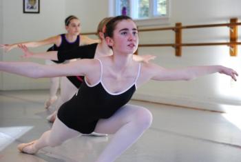 Ryland Rich of Edgecomb and Yarmouth lunges during ballet class at The Ballet School in Topsham. Courtesy of The Ballet School in Topsham Ryland Rich