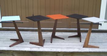 Bi-Ped Tables, by Eben Blaney, of Eben Blaney Furniture of Edgecomb. Blaney mixes his own colors and adds them to lacquer to create a translucent-like stain. Blaney, and pieces from his original furniture designs will be at the Arts & Yachts event, August 21-24 at Hodgdon Yacht Services. Courtesy of Eben Blaney Eben Blaney Bi-Ped Table