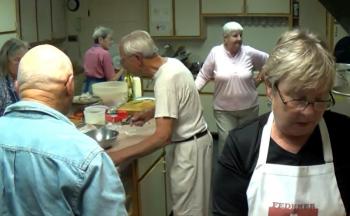 Volunteers work in the Second Congregational Church getting ready for the BikeMaine group. Courtesy of Mal Gormley