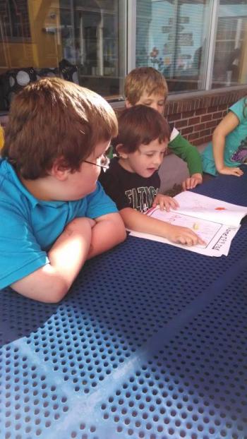 Mrs. Hallowell's kindergarten and Miss Brown's second grade classes came together as authors in a lovely outdoor classroom last week at Wiscasset Primary School. Miss Brown's class shared its story, entitled "The Acorn's Battle." Then the kindergarten students partnered up with second grade students to read their very first published stories. Everyone is looking forward to sharing more stories as our writing grows. Courtesy of Becky Hallowell/Wiscasset Primary School