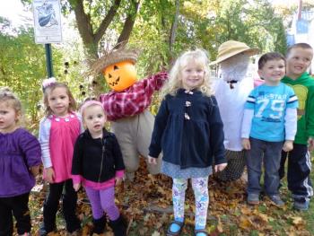 All the children pose with our new scarecrow friends. Courtesy of Natalie Castonia
