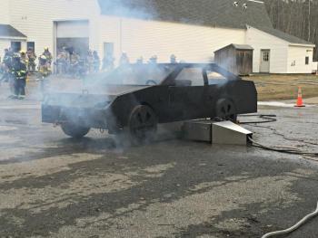 Smoking up the prop car before starting the fire. KATRINA CLARK/Boothbay Register