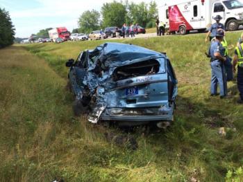 Maine State Trooper Greg Stevens managed to walk away from his wrecked cruiser July 30, after being rear-ended by a tractor trailer truck. (Photo courtesy Maine Office of Public Safety)