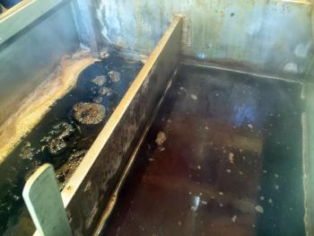 The sap is cooked in three stages in a large vat, or evaporator. SUZI THAYER/Boothbay Register