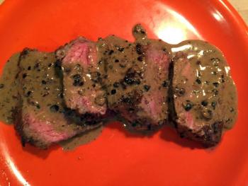 Steak au poivre served the classic way — with a brandy and cream sauce. SUZI THAYER/Boothbay Register