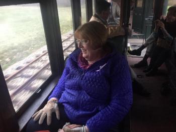 Deb Olson rides a train at Wiscasset, Waterville & Farmington Railway Museum in Alna on May 5. SUSAN JOHNS/Wiscasset Newspaper