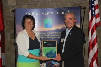 Elaine Jones is presented the 2016 Visionary Award by Don Hudson of the Gulf of Maine Council on the Marine Environment on June 7 in Fredericton, New Brunswick. Courtesy of Elaine Jones