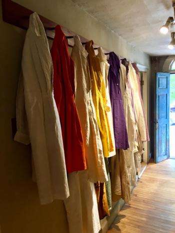 A row of 19th century handwoven linen chemises are displayed in a hallway at the Marston House. SUZI THAYER/Boothbay Register