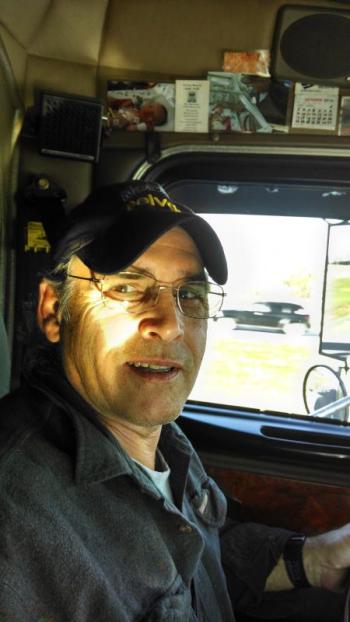 Joe Westleigh in the driver’s seat of the 18-wheeler. Courtesy of Melisa Westleigh