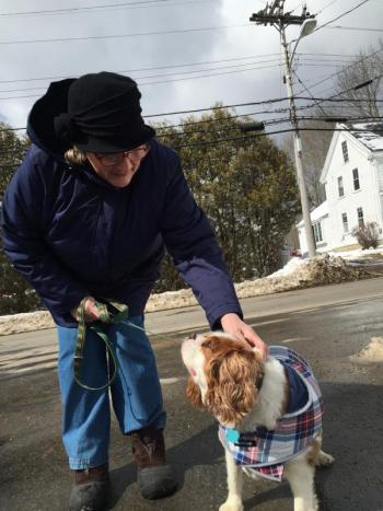 Wiscasset’s Sheila Ellis walks her King Charles, Churchill, on Federal Street March 9. SUSAN JOHNS/Wiscasset Newspaper
