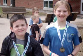 Brady Mclaughlin and Jessie Willey with their winner’s medals. ART MAYERS/Wiscasset Newspaper