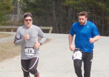 Father and son runners Stephen and Layne Graffam finish the race together. ART MAYERS/Wiscasset Newspaper