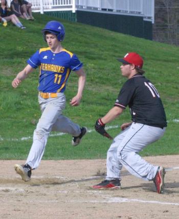 Boothbay’s Brett Hollowell scores on a passed ball. That's Andrew Hendrickson covering. PHIL DI VECE/Wiscasset Newspaper