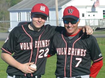 Following the game, Coach Gregg Wood awards a game ball to Hayden Dunning. PHIL DI VECE/Wiscasset Newspaper