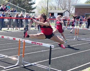 Ayanna Stover competes in the girls 3 by 60-meter shuttle hurdle. Courtesy of Josiah Winchenbach