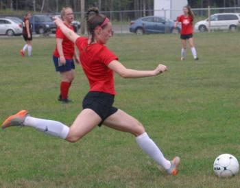 Gwen Webber takes a free kick early in the game with Monmouth played on the Wiscasset Middle High School lower field. PHIL DI VECE/Wiscasset Newspaper