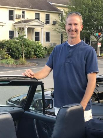 Chris Williams stands beside his 1985 Porsche. KELLIE BIGOS/Boothbay Register