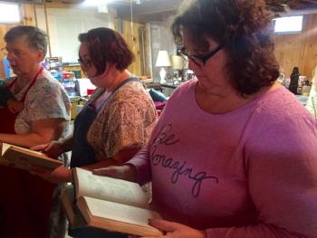 From left Jean McGuigan, daughter Sarah McGuigan and Jean’s sister and Sarah’s aunt, Phyllis Kenney at the yard sale. SUSAN JOHNS/Wiscasset Newspaper