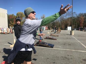 Jason Greenleaf of Sidney take a cornhole practice throw at Ames True Value Oct. 14 before tournament play begins. SUSAN JOHNS/Wiscasset Newspaper