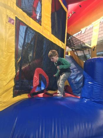 Jack Dowen, 4, of Wiscasset re-enters a bounce house during Sunday’s cornhole tournament at Ames True Value Oct. 14. SUSAN JOHNS/Wiscasset Newspaper