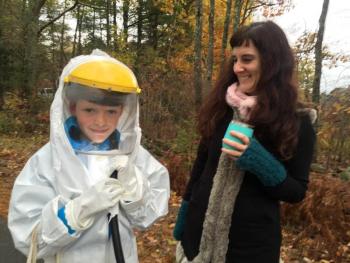 Atticus Donaghy, 10, of Newcastle, as a hazardous materials worker, and his mother Erin Rhodes attend Trick or Treat Street. SUSAN JOHNS/Wiscasset Newspaper