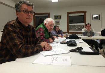 From left, Alna Second Selectman Ed Pentaleri and Third Selectman Doug Baston listen to a resident Nov. 28. SUSAN JOHNS/Wiscasset Newspaper