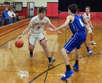 Billy Pinkham brings the ball down the court. PHIL DI VECE/Wiscasset Newspaper