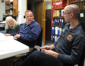 Selectmen Allison Hepler and Jason Shaw listen to EMS Director Brian Carlton. PHIL DI VECE/Wiscasset Newspaper