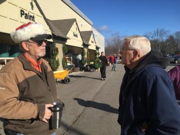 Chuck Billings, left, and James Murphy talk at the Masons' Lincoln Lodge of Wiscasset cement mixer drive to raise money for area food banks. SUSAN JOHNS/Wiscasset Newspaper