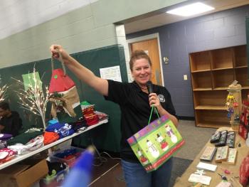 Parks and Recreation Director Lisa Thompson holds up a door prize. SUSAN JOHNS/Wiscasset Newspaper
