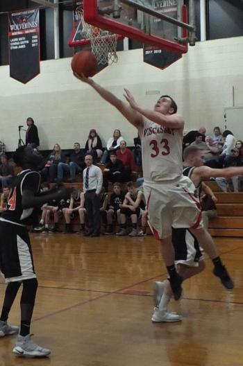 Haiden Dunning drives to the basket in Saturday’s game with Lisbon. PHIL DI VECE/Wiscasset Newspaper