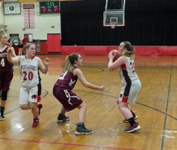 Sydnie Thayer has the ball. Also pictured is the Wolverines’ Kateleen Trask. PHIL DI VECE/Wiscasset Newspaper