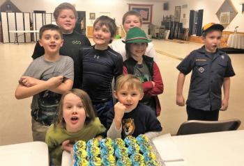 The Pack also celebrated the Feb. 8 founding of Boy Scouts of America, with cupcakes! Scouts, back, left: Ethan Smith, Griffin Smith; middle row, left: Alexander Lash, Jeffrey McKinney, Nathan Percival, Kolton McKenney; front, left: Rowan Barter and Blake Haley. Robin Ford photo