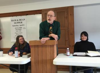 Moderator Chris Cooper quips. At left is Town Clerk Liz Brown. At right, First Selectman Melissa Spinney. SUSAN JOHNS/Wiscasset Newspaper