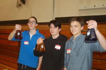Students Archie Brewer, Ivan Putnam and Gage Varian prepare a chemistry experiment. ART MAYERS/Wiscasset Newspaper