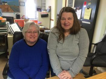 Alna Town Clerk Liz Brown, right, and Deputy Clerk Lynette Eastman pause for a photo on one of their last days at the old town office. SUSAN JOHNS/Wiscasset Newspaper