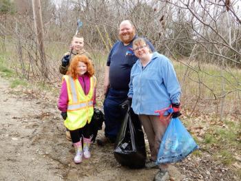 Christopher and Bonnie Wormwood and family, who lost their Westport Island home to fire in February and have appreciated the support they received from their community, took time out to give back by helping with the Westport Island Conservation Commission's annual "Keep the Island Green" cleanup. Courtesy of Gaye Wagner