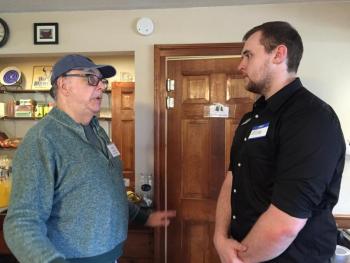 Russell Cloutier, left, and Midcoast Federal Credit Union's Mike Sprague chat. SUSAN JOHNS/Wiscasset Newspaper