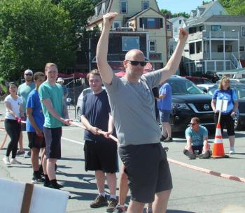 This Crusher Claws team member flexes his claws for the crowd. LISA KRISTOFF/Boothbay Register