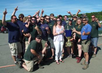 Who’s number one, two years running? Clear Stream Construction, that’s who! Stephanie Branch, center, returns the first place trophy to the team. LISA KRISTOFF/Boothbay Register