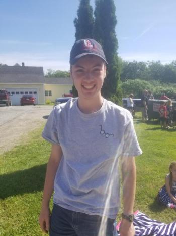 Recent WMHS graduate Zack Mank waits eagerly for the parade to begin. VANESSA DUNN/ Wiscasset Newspaper