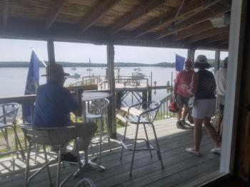 Community members enjoy a beautiful view and strawberry shortcake at the Wiscasset Yacht Club. VANESSA DUNN/ Wiscasset Newspaper