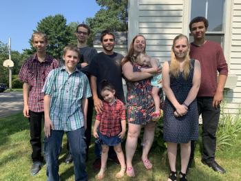 Clockwise, from front, are Allyson King, 4, Alton King IV, 13, Mathew Pearson, 12, Christian Pearson, 16, Alton King III, Jean Bradford holding 2-year-old Hannah King, McKayla King, 14, and Elijah Pearson, 14. Bradford and fiancé Alton King III said daughter Nevaeh King, 9, not pictured, will also live there. SUSAN JOHNS/Wiscasset Newspaper