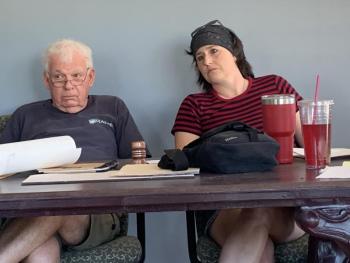 Alna Second Selectman Doug Baston, left, and First Selectman Melissa Spinney take part in the July 24 board meeting. SUSAN JOHNS/Wiscasset Newspaper