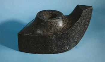A fundraising raffle will be held for “Vessel with Hole” (Dakota granite, 8 x 8 x 14) by the late Don Meserve. Don Meserve