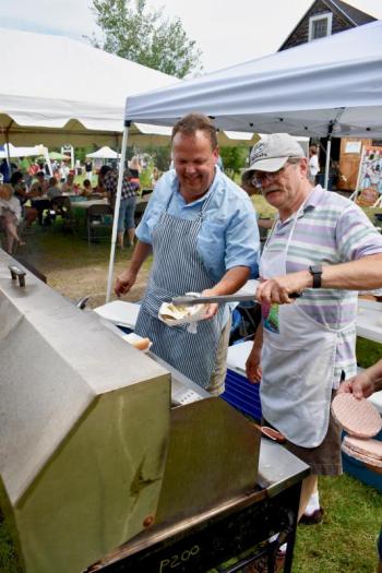 Selectmen Jason Shaw and Allen Greene manned the grill. PHIL DI VECE/Wiscasset Newspaper