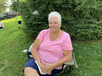 Jenn Spaur takes in the concert on a nice Wiscasset night Aug. 1. SUSAN JOHNS/Wiscasset Newspaper