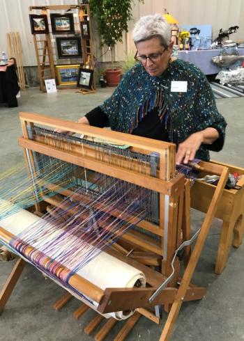 Jill Butke weaves. KELLIE BIGOS/Boothbay Register