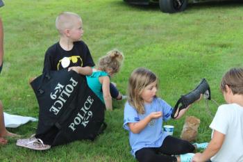 Children pass around equipment being shown. VANESSA DUNN/Wiscasset Newspaper