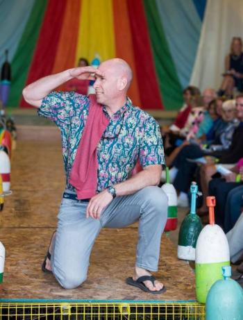 Model Brian Blethen hams it up on the lobster trap runway last year! Courtesy photo